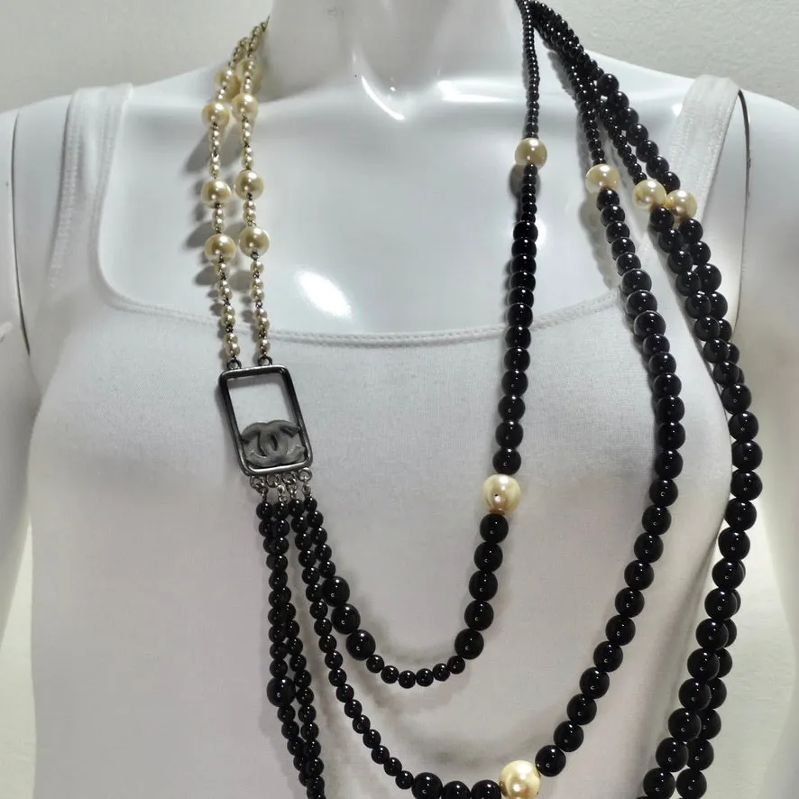 Chanel 2010 Black and Ivory Resin Pearl Multi Strand CC Logo Necklace