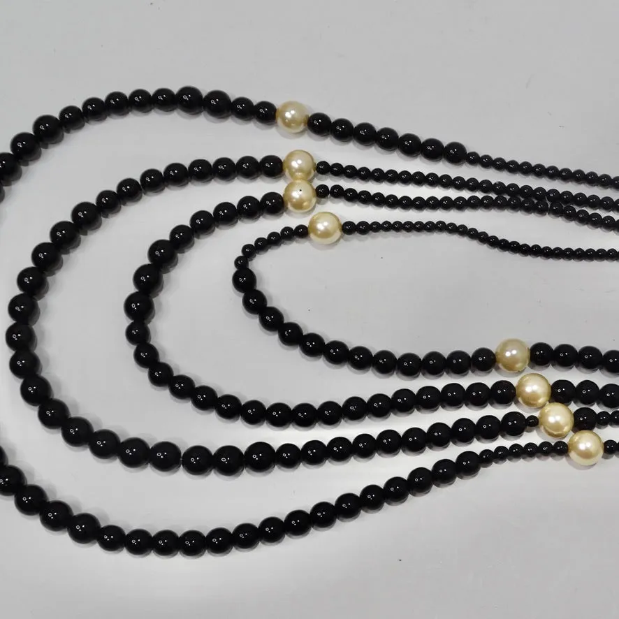 Chanel 2010 Black and Ivory Resin Pearl Multi Strand CC Logo Necklace