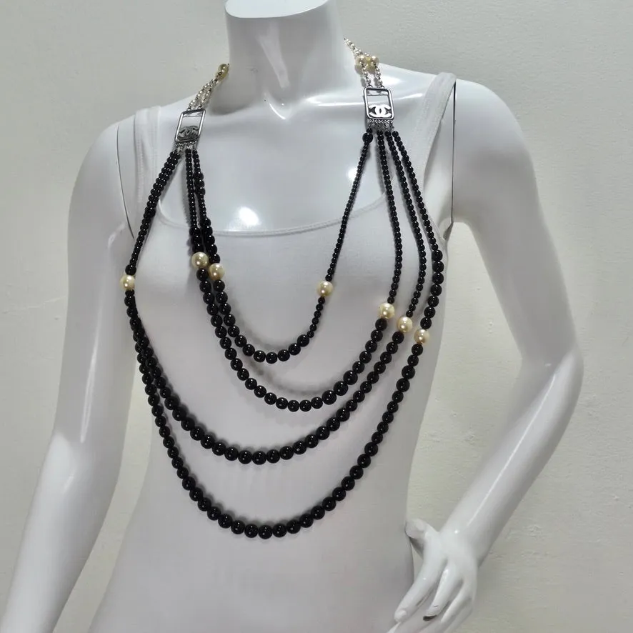 Chanel 2010 Black and Ivory Resin Pearl Multi Strand CC Logo Necklace