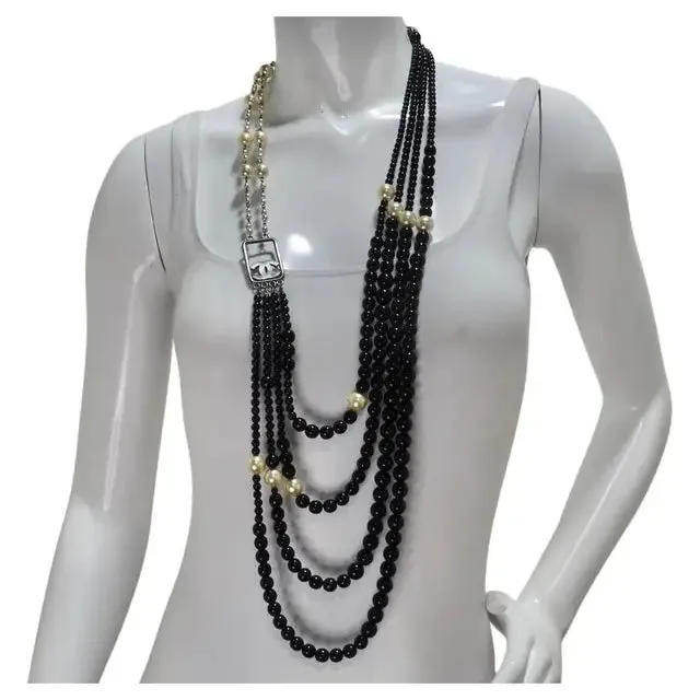 Chanel 2010 Black and Ivory Resin Pearl Multi Strand CC Logo Necklace