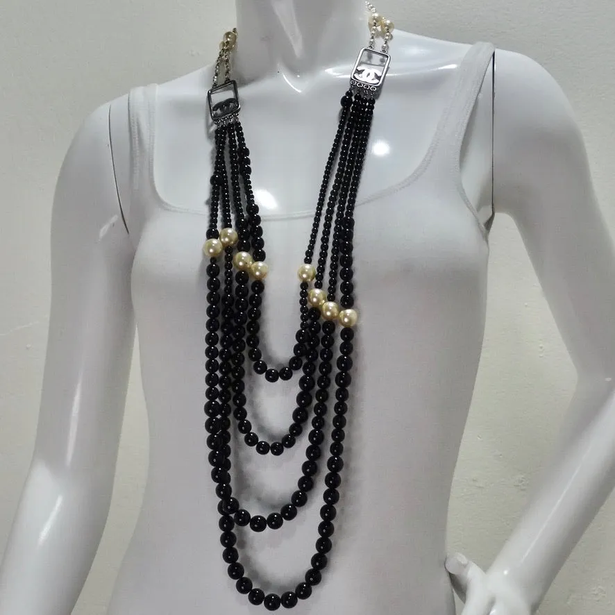 Chanel 2010 Black and Ivory Resin Pearl Multi Strand CC Logo Necklace