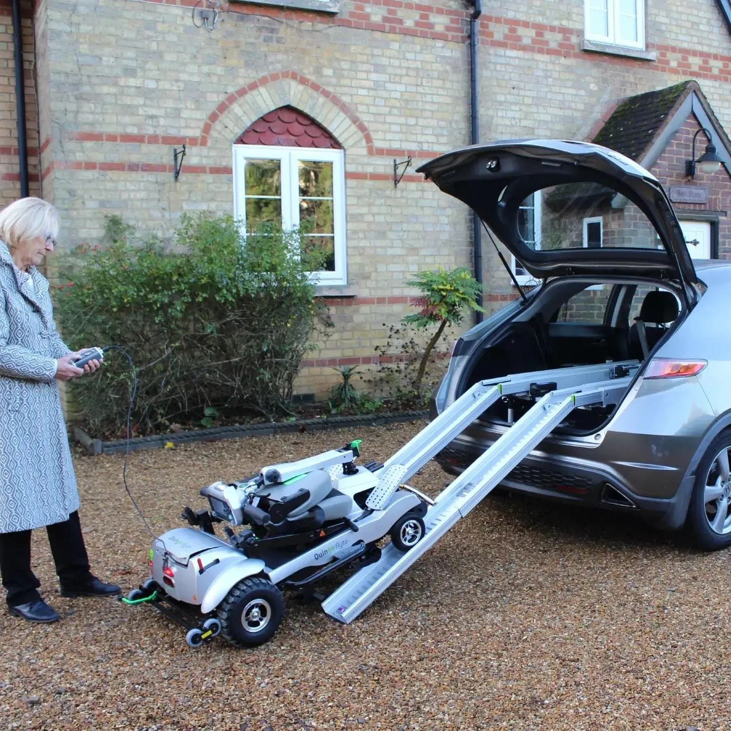 ComfyGo Quingo Flyte Mobility Scooter with MK2 Docking Station