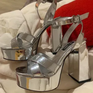 Silver platform Nine West heels